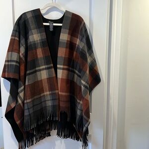 Eivissa brown, and black plaid fleece shawl. Very warm.